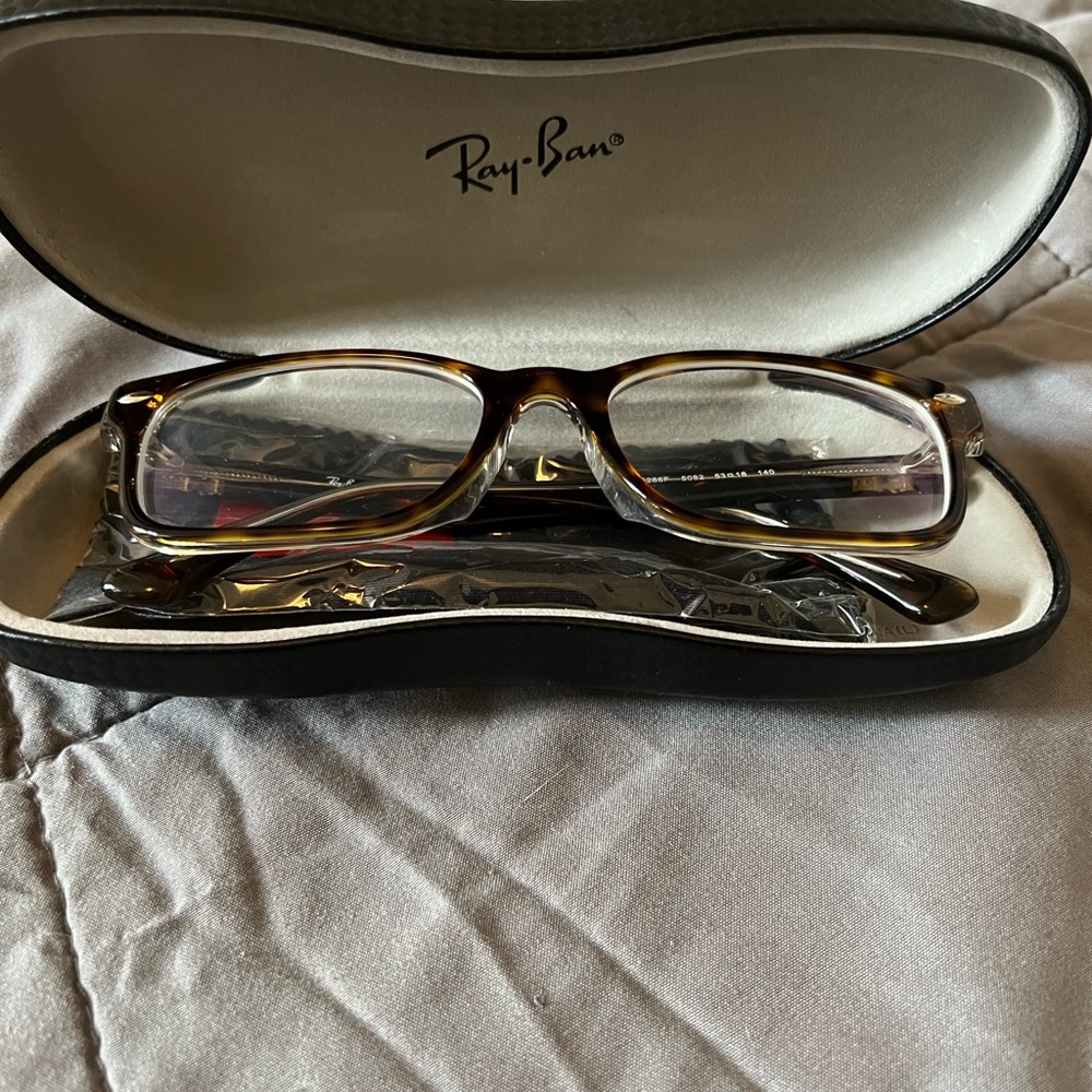 Ray Ban tortoise eyeglasses.